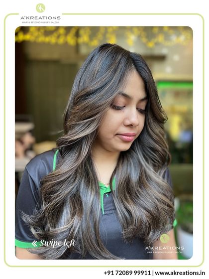 A gorgeous example of cool-toned highlights on dark hair. This look adds a modern, ashy dimension while maintaining a soft and natural feel.