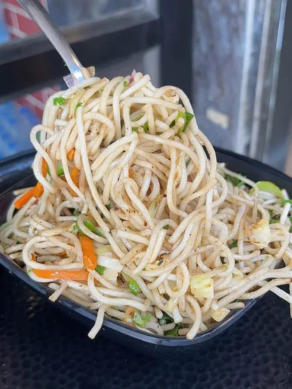 A forkful of my classic Hakka Noodles, a simple and satisfying dish that's always a good choice.