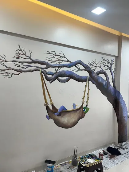 A work-in-progress shot of the Krishna mural, before the leaves and flowers were added to the tree.
