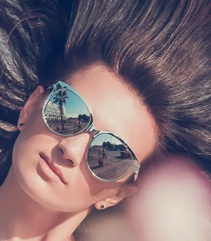 This editorial-style shot shows my creative approach to accessory photography. By focusing on the reflection in the sunglasses, I can tell a story, capturing the beachside location and creating a unique, high-fashion image.