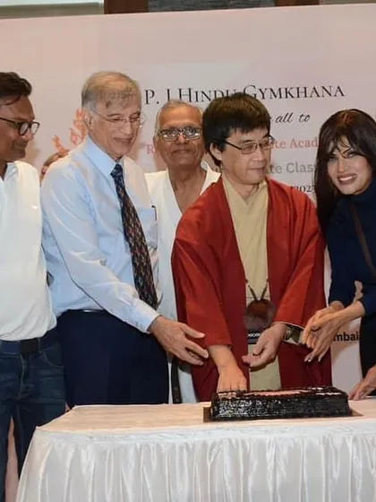 Our esteemed guests, including the Consul-General of Japan and Shri Niranjan Hiranandani, join us in a cake-cutting ceremony to celebrate the opening of our new dojo.