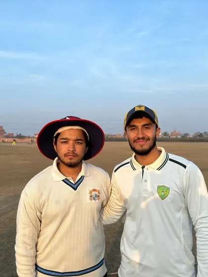 Delhi Blues players Ankit Negi and Vaibhav Kumar after a victorious match. Their significant contributions with bat and ball were key to the team's success.