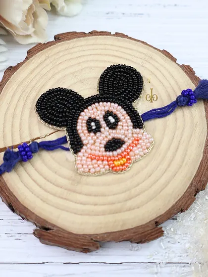 A close-up of our beaded weave Rakhi featuring Mickey Mouse, perfect for the little Disney fan in your family.