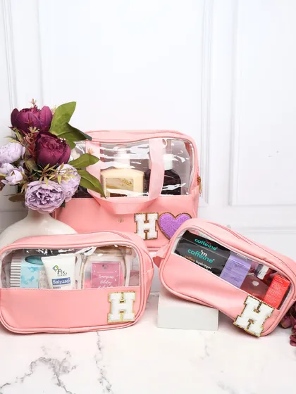 The same set of 3 personalized wash bags in a beautiful baby pink color. The clear panels make it easy to see what's inside each bag.