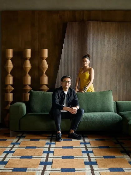 A portrait of us, Farah Ahmed and Dhaval Shellugar, within a space we designed for Ventura Gallery. This setting reflects our approach to creating curated environments that feel both eclectic and harmonious, much like a well-designed home.