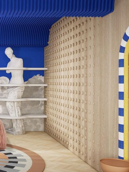 The dotted wall creates a fascinating play of light and shadow, adding depth and interest to the room.