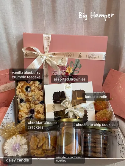 This is my Big Hamper for Diwali, and I get so excited putting it together. It’s filled with a vanilla blueberry crumble teacake, assorted brownies, jars of cookies and cheddar cheese crackers, and even a couple of festive candles. It's the perfect gift when you want to be a little extra.