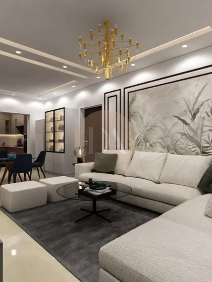 A 3D render of a living room with a neutral L-shaped sofa and elegant wainscoting. The design includes a dining area and crockery unit, demonstrating our skill in creating cohesive, multi-functional spaces.