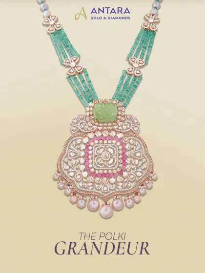 This piece showcases what I call 'Polki Grandeur'. Crafted for moments you’ll cherish, this necklace features an intricate pendant with meenakari work, set against strands of beautiful green beads.