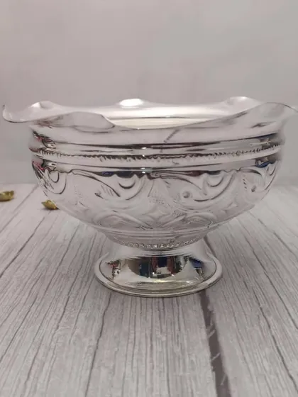 A German silver flower bowl with a fluted, petal-like rim, perfect for serving sweets or for decoration.
