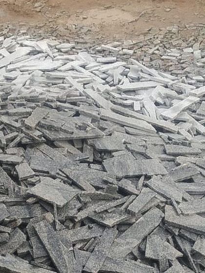 For a new project at the base of Nandi Hills, we are using waste off-cuts from nearby granite processing facilities. This pile of discarded stone will become the load-bearing walls of the house.