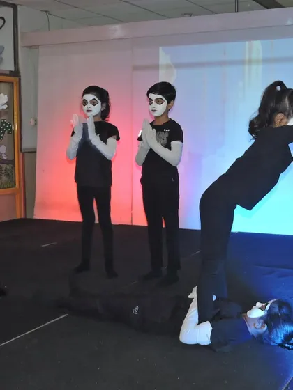 Students perform a synchronized mime act, demonstrating teamwork, discipline, and a unique form of creative expression that we encourage at our school.