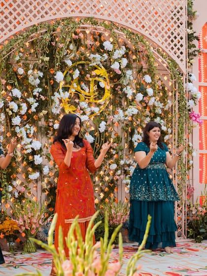 The ladies of the family all smiles during their graceful performance.