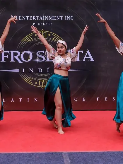A triumphant moment from our performance at the Afro Sekita festival in Bangalore. This shot captures the joy and artistry we bring to every choreography.
