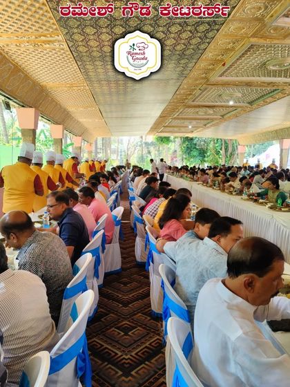 Another angle of the grand dining hall, showing the scale and organization of our catering service for large events.