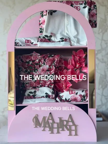 We designed this grand baby wardrobe for a little D&G baby. The pink and floral theme perfectly complements the designer clothes inside.