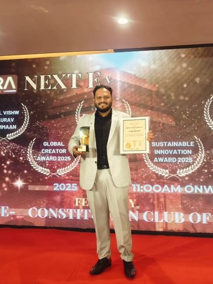 Posing with the Global Creator Award and other honors. Each award is a reminder of the responsibility I have to my patients and to the science of Ayurveda.