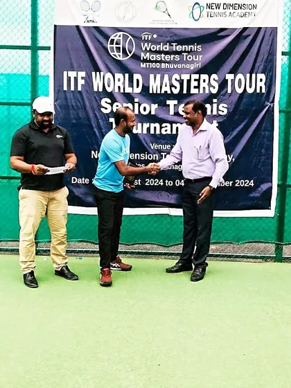 A handshake with the tournament official after a successful event. It's always an honor to compete.