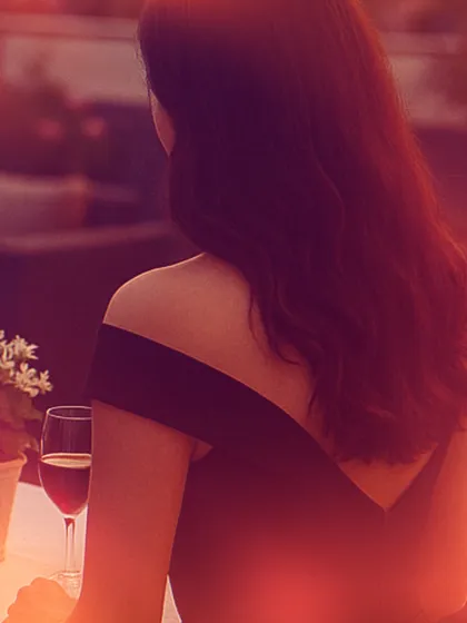 A serene moment, a glass of wine, and a beautiful sunset. My rooftop offers the perfect, elegant backdrop for a sophisticated date night or a quiet celebration.