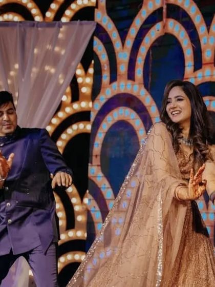 A candid shot of a couple enjoying their sangeet dance. Our goal is to make you feel so comfortable with the steps that you can just have fun and let your personalities shine through.