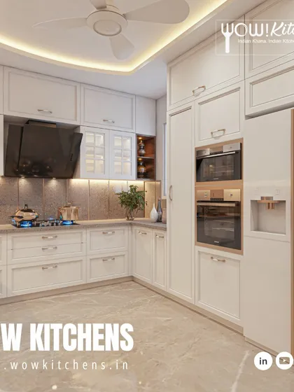 This angle highlights the integrated appliances, including the double oven and side-by-side refrigerator, which are seamlessly incorporated into the classic cabinetry.