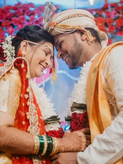 A quiet moment of connection between the bride and groom. We focus on capturing these unscripted, intimate exchanges that truly define the love you share on your wedding day.