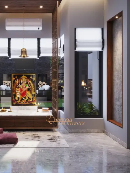 This side view shows how the pooja area is integrated into the home's layout, with a small fireplace visible through a window, adding to the warm and serene ambiance.