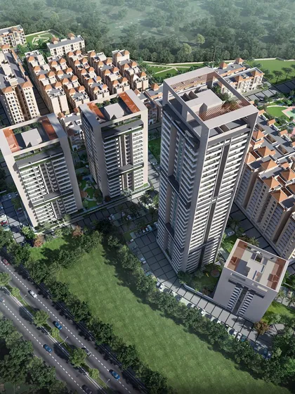 An aerial view of the high-rise development, illustrating the master plan and its integration with lower-density housing and green spaces.