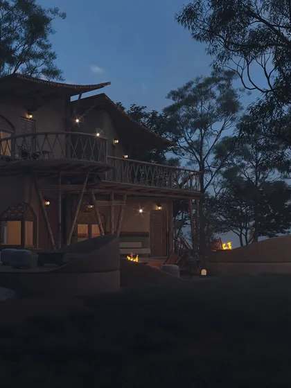 As evening descends, the resort's exterior lighting creates a warm and inviting glow. The fire pits become focal points for social gathering, while the illuminated balconies offer private spaces for quiet reflection.