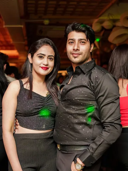 A couple enjoying the VIBE CHECK night together.