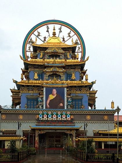 The stunning Golden Temple at the Namdroling Monastery in Bylakuppe, a peaceful and culturally rich place we visit during our Coorg exploration.