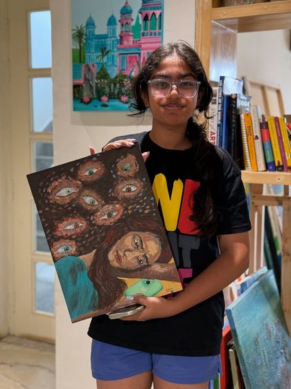 This young artist explored a more surrealist style with her captivating painting. I encourage kids to express their unique inner worlds and ideas through their art.