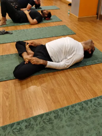 Another variation of the fish pose, demonstrating deep relaxation and release. This is often one of the final poses in a class, preparing the body for Savasana.