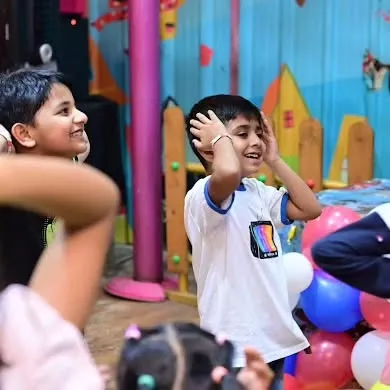 The look of pure excitement on a child's face during a party game is priceless.