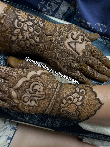 A design featuring the initials 'A' and 'S' in a stylish font, surrounded by intricate patterns.