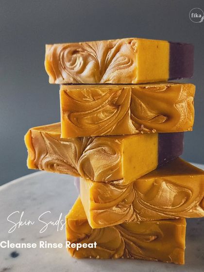 Skin suds to cleanse, rinse, and repeat. These stacked Turmeric and Alkanet root soaps show the vibrant natural colors I can achieve. My organic, plant-based soaps are designed to restore a healthy, radiant glow.
