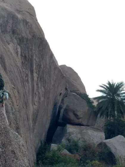 A climber on one of the technical routes at Mayaganahalli Betta. This area is known for its intense climbs that will test your skills.