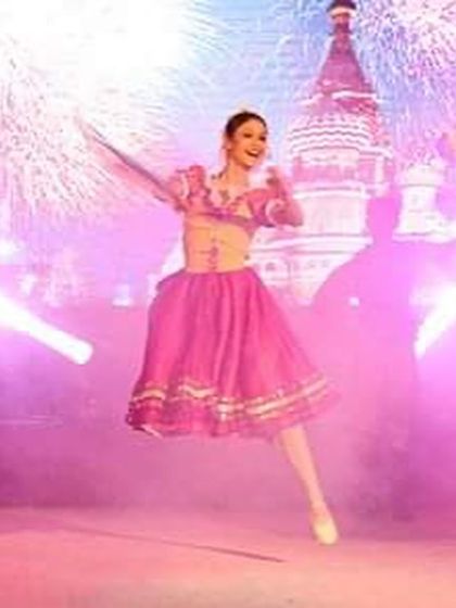 The feeling of flying across the stage in a grand jeté is pure joy. This photo captures the energy and athleticism that ballet demands. I teach my students the foundational techniques to safely build towards these exciting and expressive movements.