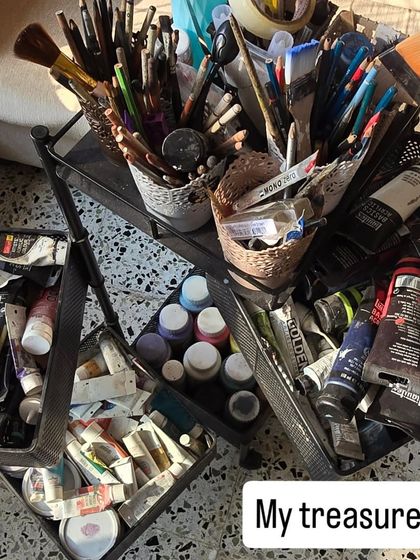 My treasure. A glimpse into the organized chaos of my art supplies. Every tube of paint and every brush holds the potential for a new creation.