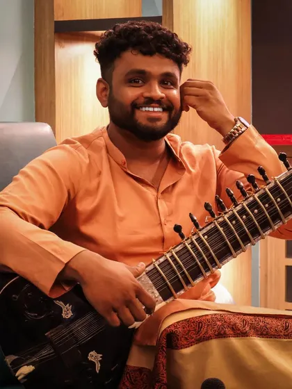Just me, my sitar, and a smile. At the end of the day, it's all about the joy of making music. This is the feeling I hope to share with you at your event.