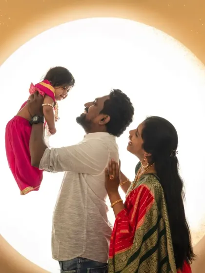 A creative family silhouette against a full moon backdrop. This image combines the Krishna theme with my signature backlit style for a truly unique family portrait.