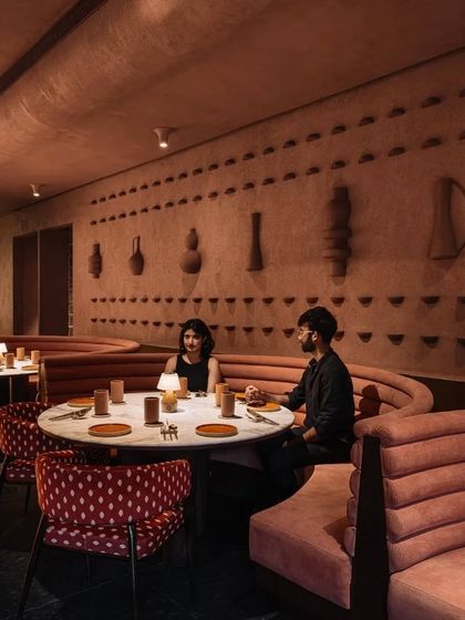The fine dining space at Idylll is designed to be an immersive experience, with curved seating that encourages conversation and a rich palette of textures that engages the senses.