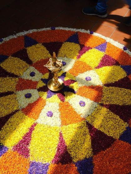 A beautiful 'Pookalam', or flower arrangement, is an essential part of Onam celebrations. It sets a festive mood that perfectly complements the grand Sadhya feast that follows.