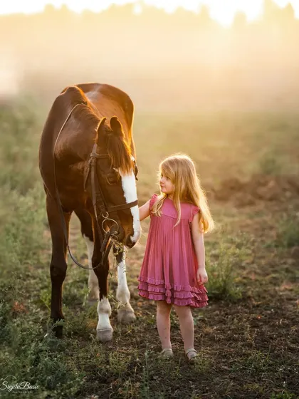 There are moments that feel like they are straight out of a fairytale. This portrait of a little girl and her horse, bathed in the golden morning light, was a dream come true for me to capture. It’s a farewell to a friend, immortalized forever.