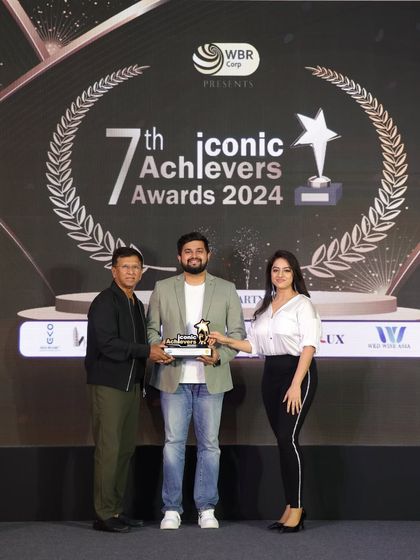 On stage receiving the 7th Iconic Achievers Award in 2024. A moment of immense gratitude for my family, my team, and every couple who has let me be a part of their journey.