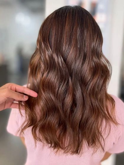 You can change your whole attitude by changing your hair color. This client is radiant with her new look.