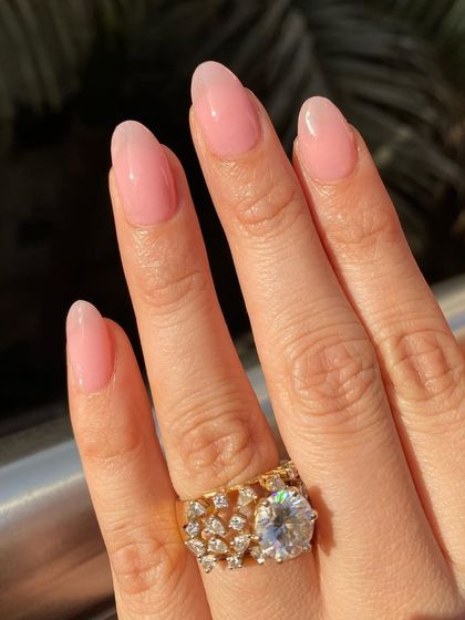 A close-up of the sheer pink overlay, showing how it enhances the natural nail.