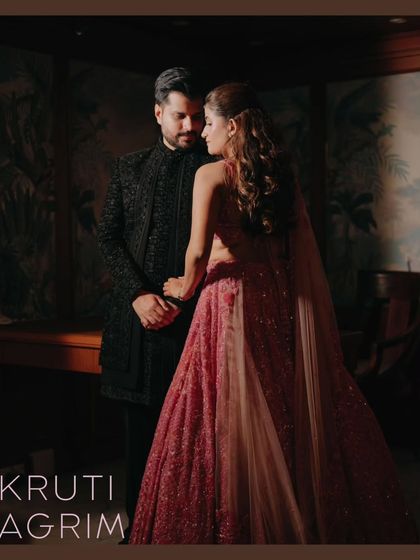 A romantic and moody portrait of the couple, framed to look like a classic painting, highlighting their deep connection.