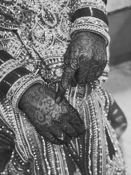 A black and white shot that highlights the intensity and detail of the henna stain.