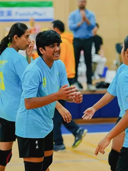 The raw emotion of competition. Our players communicating and strategizing between points, showing the mental toughness required to win a championship.
